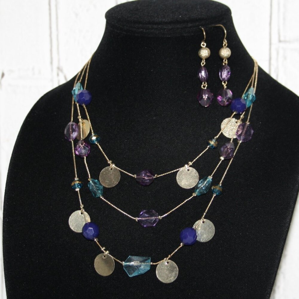 Beautiful gold layered necklace and earrings set with purple and blue